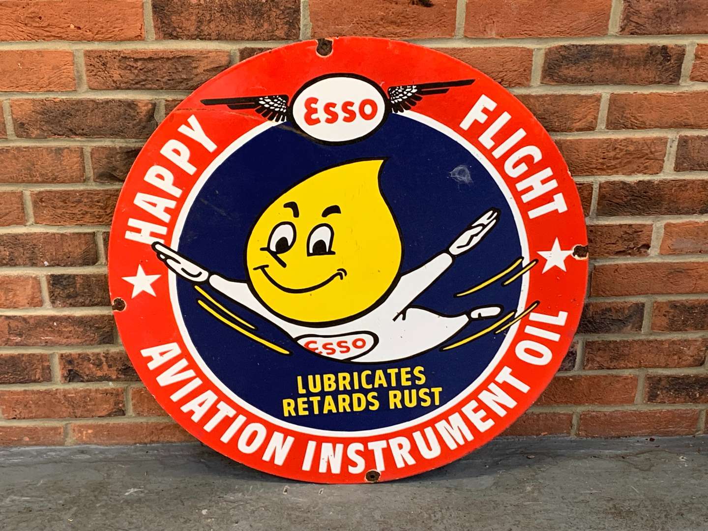 <p>Esso Aviation Instrument Oil Circular Enamel Sign</p>