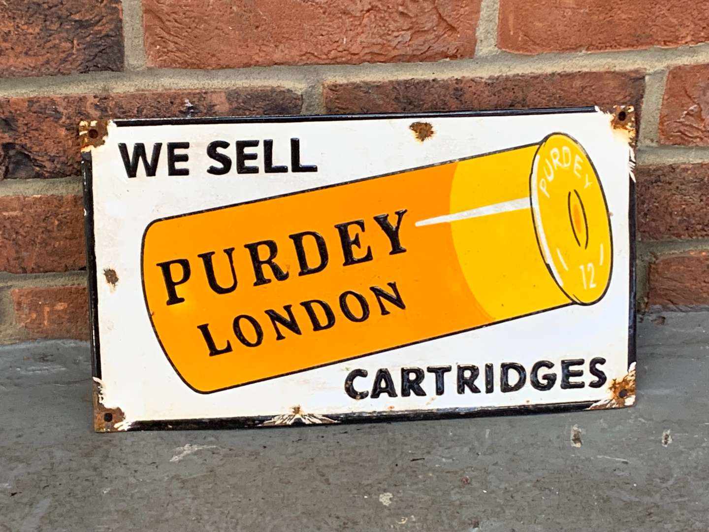 <p>We Sell Purdey London Cartridges Enamel Sign</p>