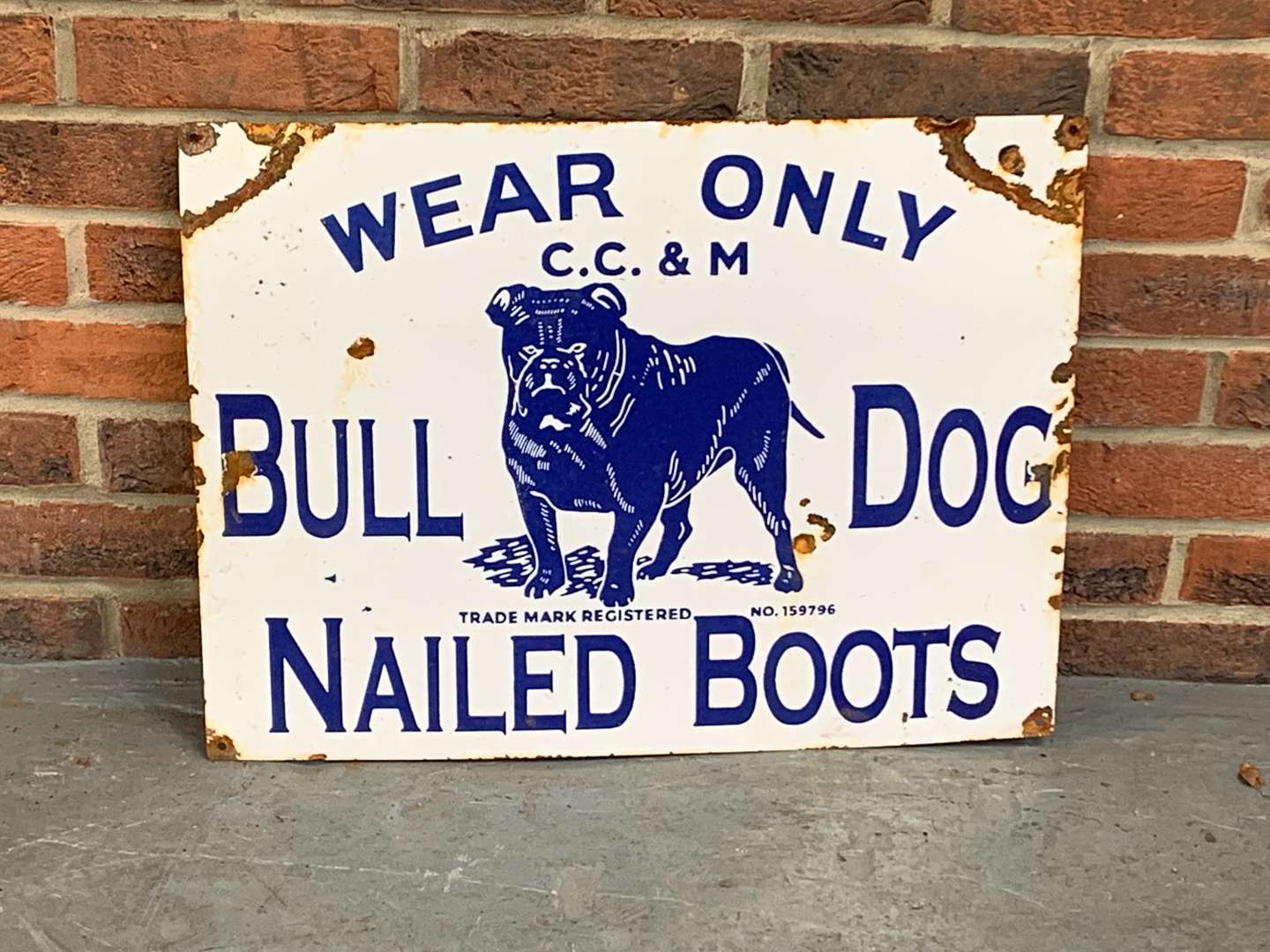 <p>Wear Only Bull Dog Nailed Boots Enamel Sign</p>