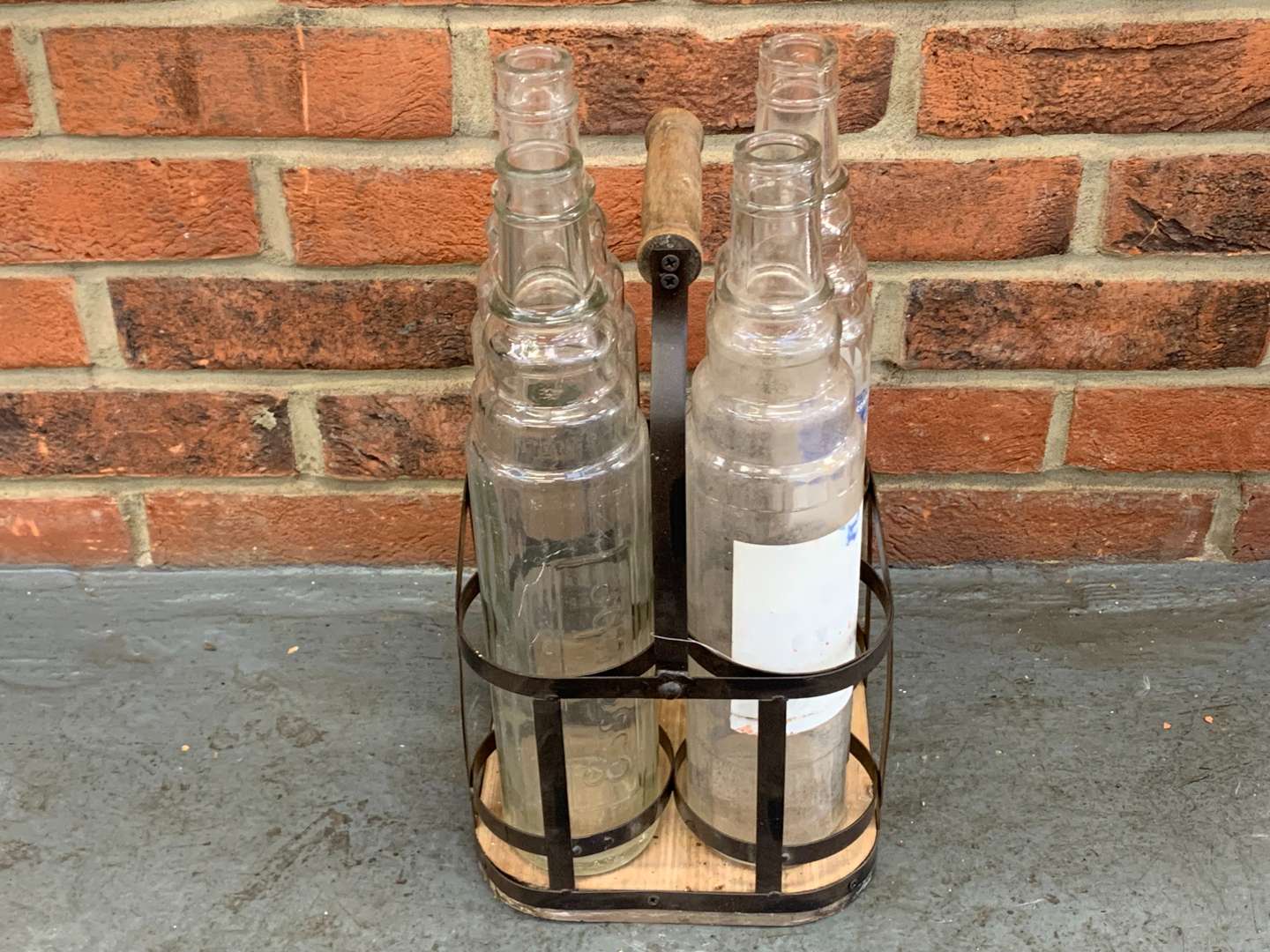 <p>Four Glass Esso Oil Bottles and Holder</p>