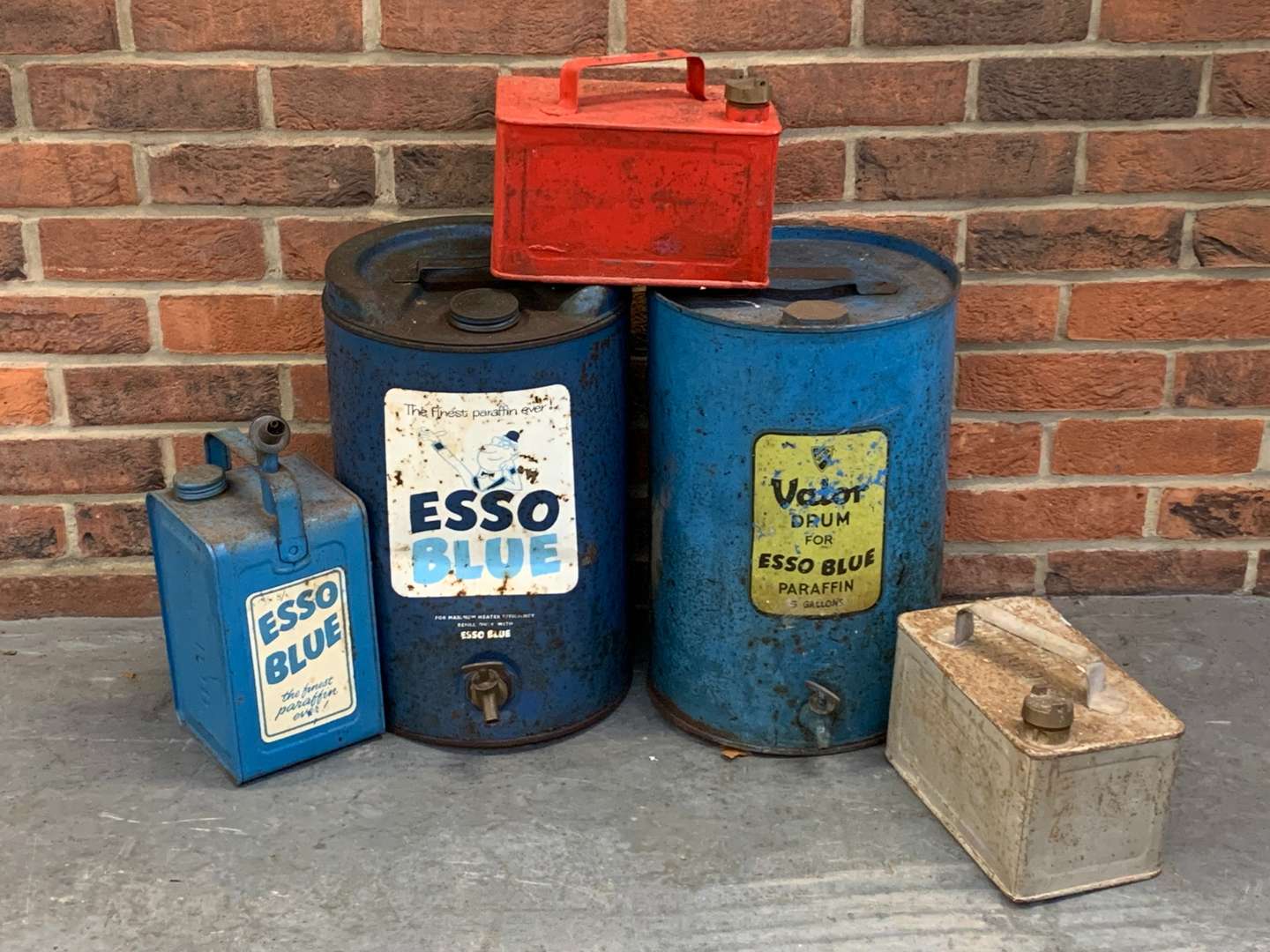 <p>Two Esso Paraffin Drums and Two One Gallon Petrol Cans</p>