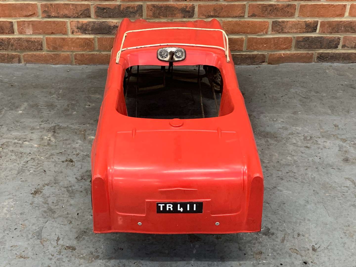 <p>Triumph TR4 Child's Plastic Pedal Car</p>