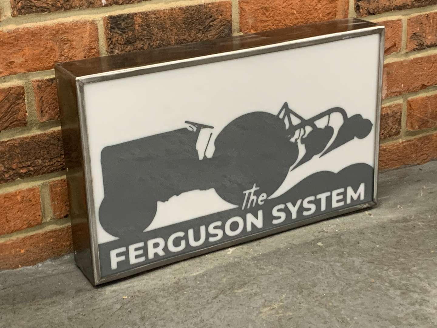 <p>The Ferguson System Made Illuminated Display</p>
