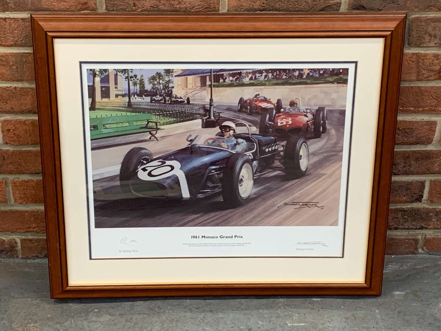 <p>Michael Turner and Stirling Moss 1961 Monaco GP Framed Print</p>