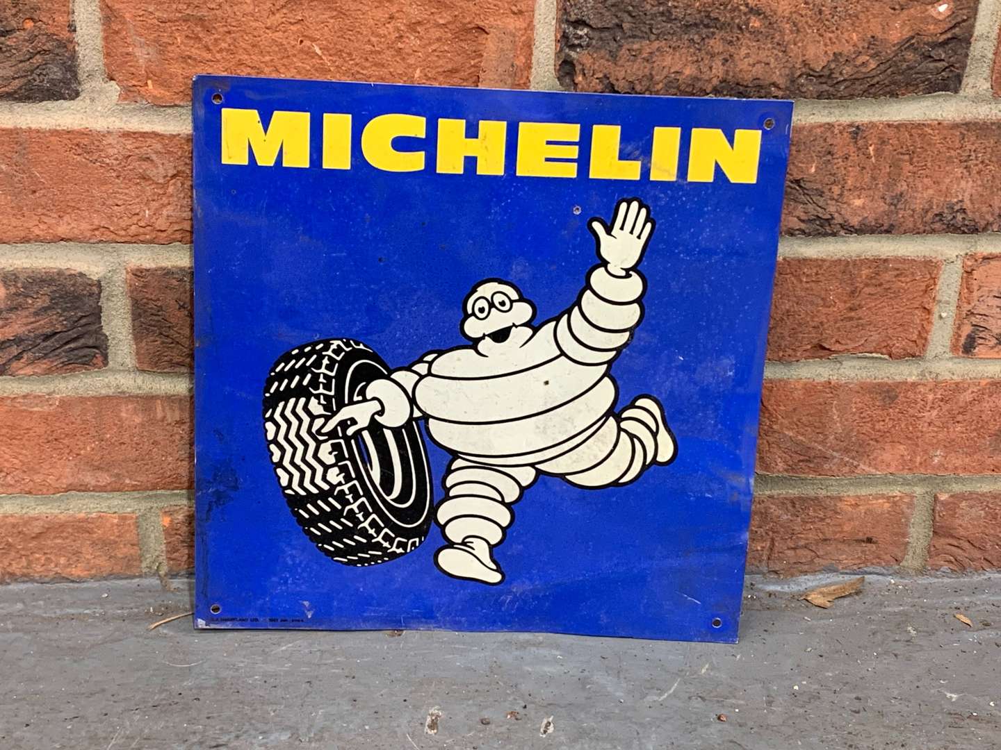 <p>Tin Small Michelin Waving Man Sign</p>