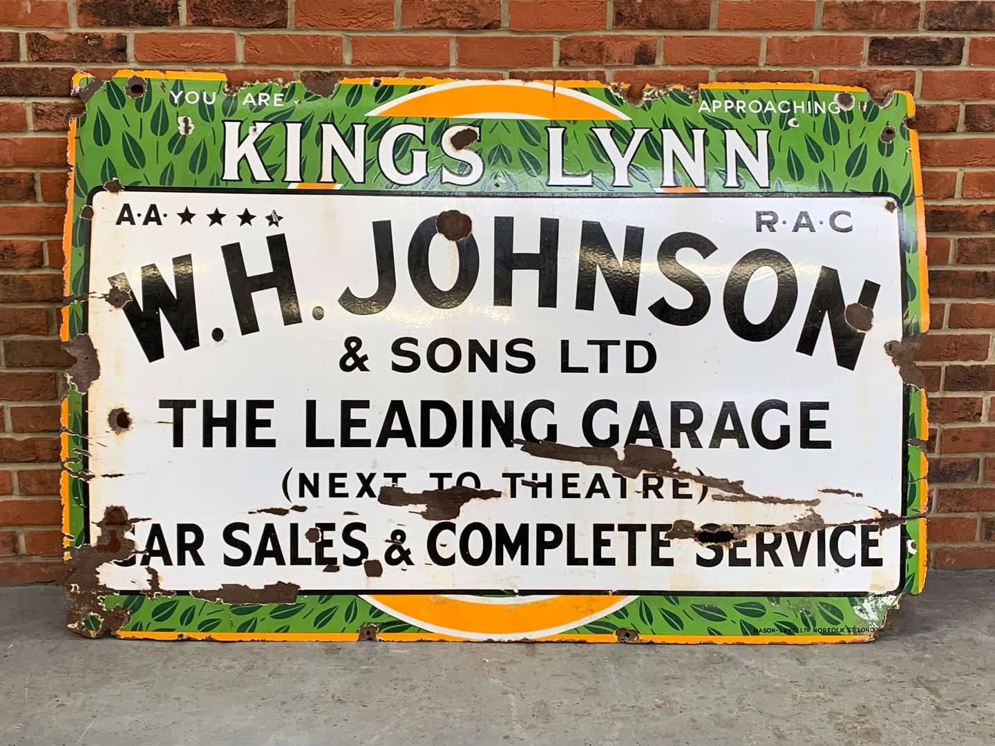 <p>Kings Lynn W.H.Johnson and Sons “The Leading Garage” Enamel Sign</p>