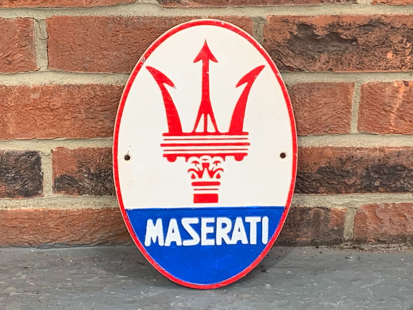 <p>Maserati Cast Iron Emblem Sign</p>