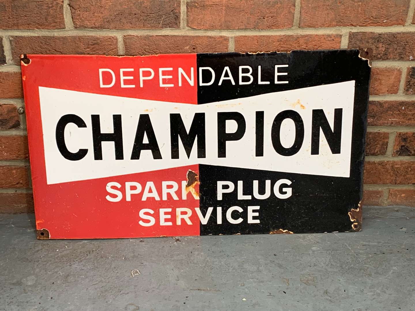 <p>Champion Spark Plug Enamel Sign</p>