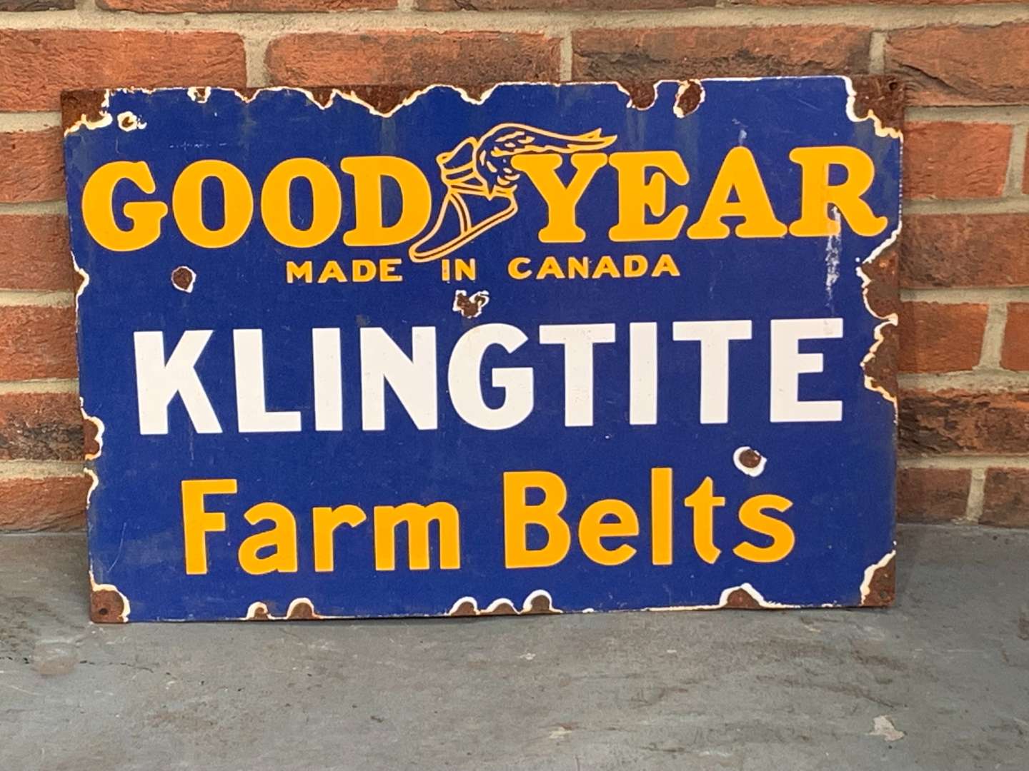 <p>Goodyear Klingtite Farm Belts Enamel Sign</p>