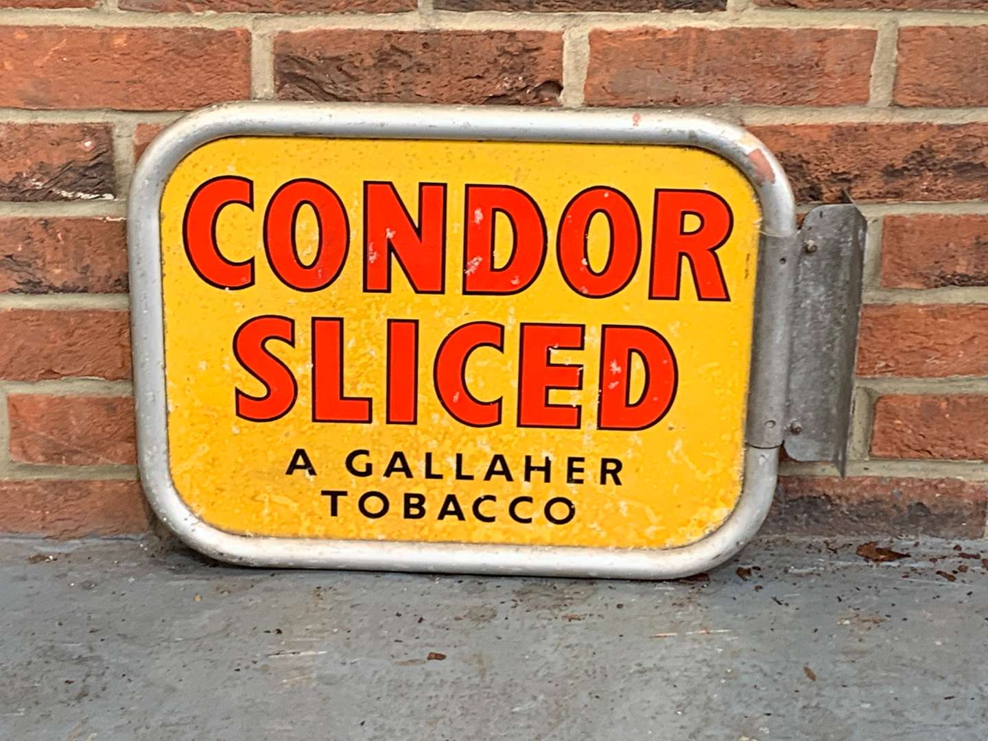 <p>Condor Sliced Tobacco Aluminium Wall Mounted Sign</p>
