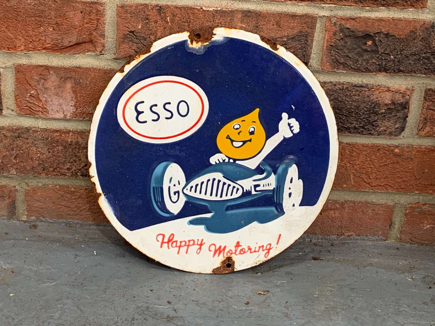 <p>Esso Happy Motoring Small Circular Sign</p>