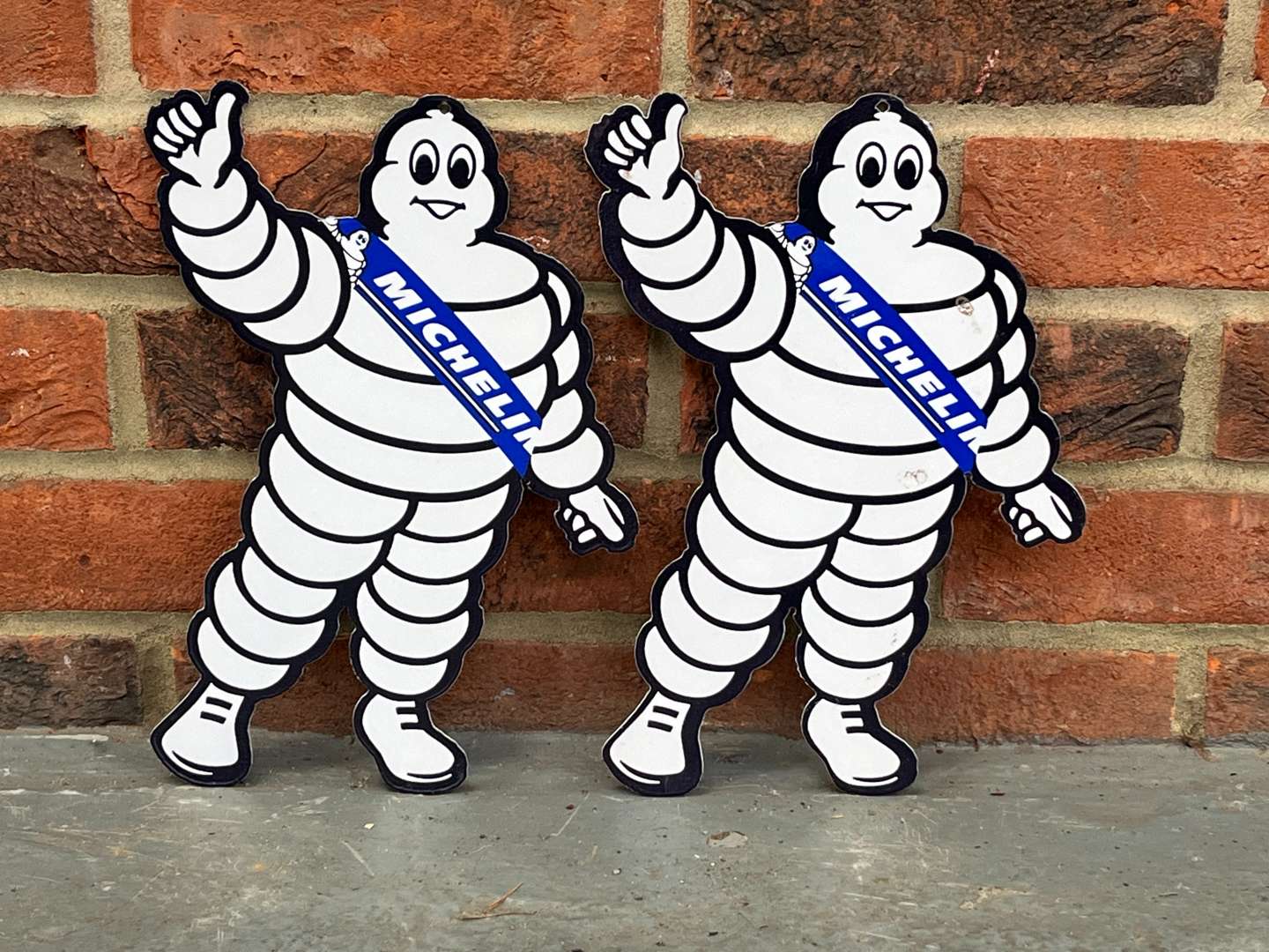 <p>Pair Of Small Michelin Men&nbsp;</p>