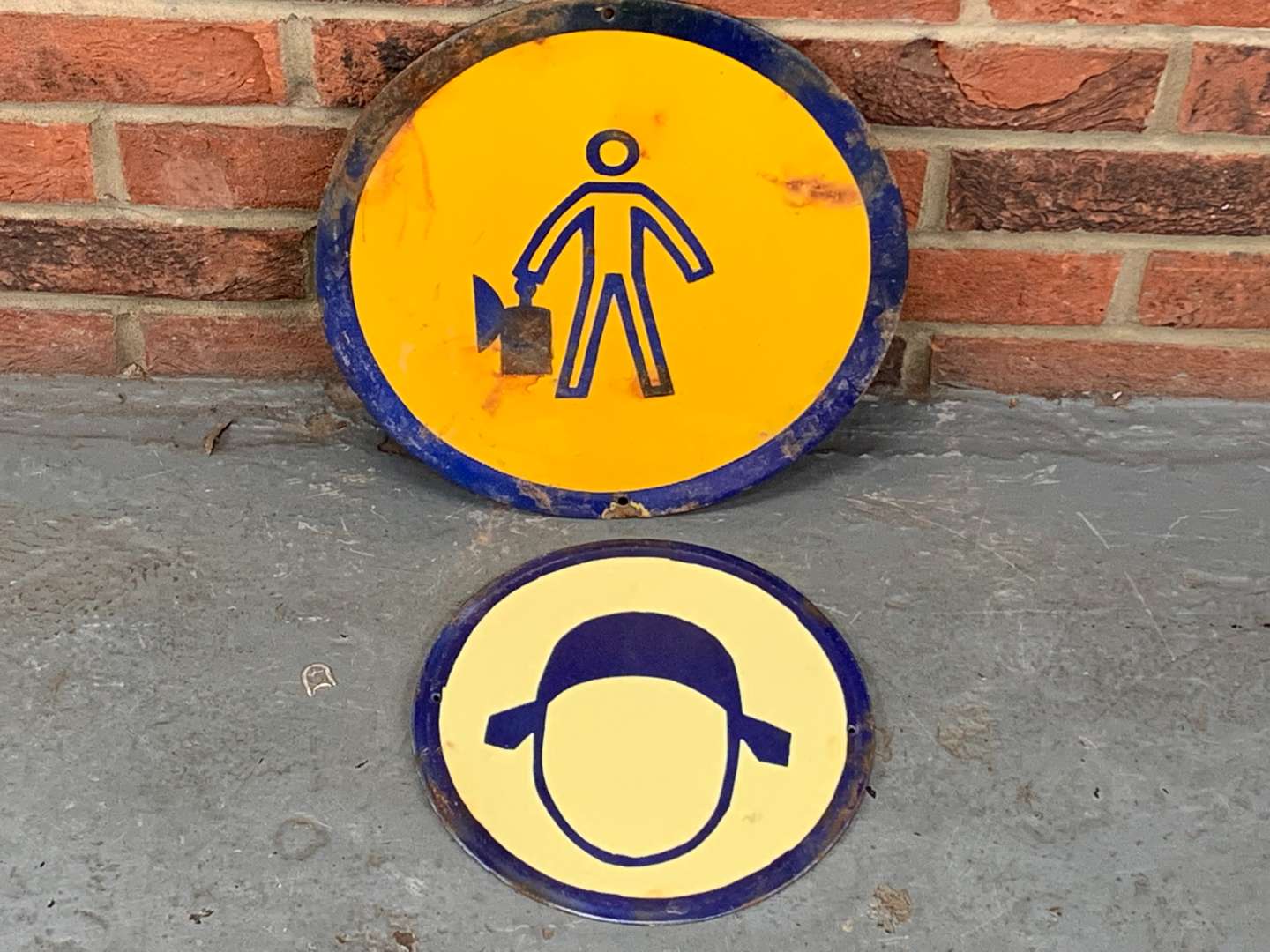 <p>Two Circular Enamel Safety Signs&nbsp;</p>