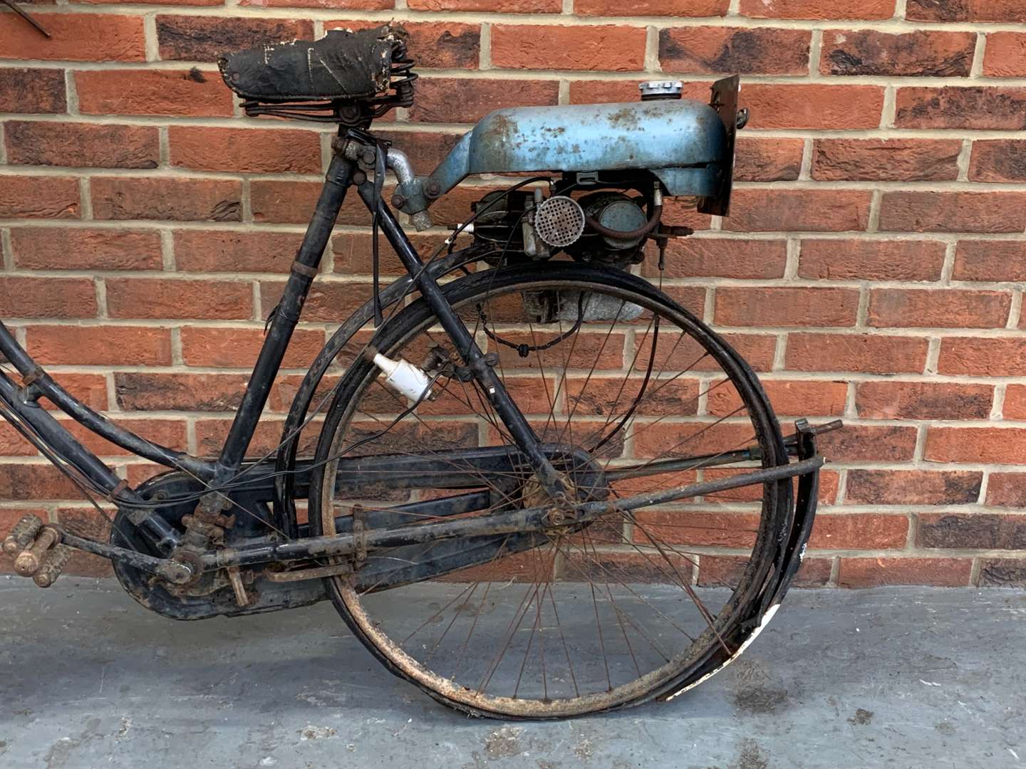 <p>Trojan Mini Motor Attached to a Vintage Bicycle</p>