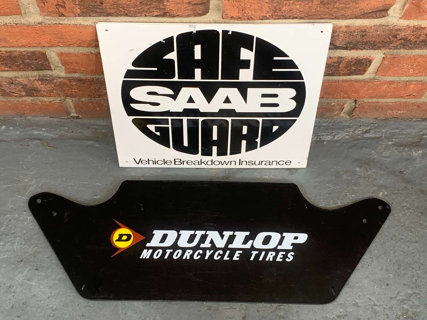 <p>Saab Safe Guard and Dunlop Motorcycle Tires Sign (2)</p>