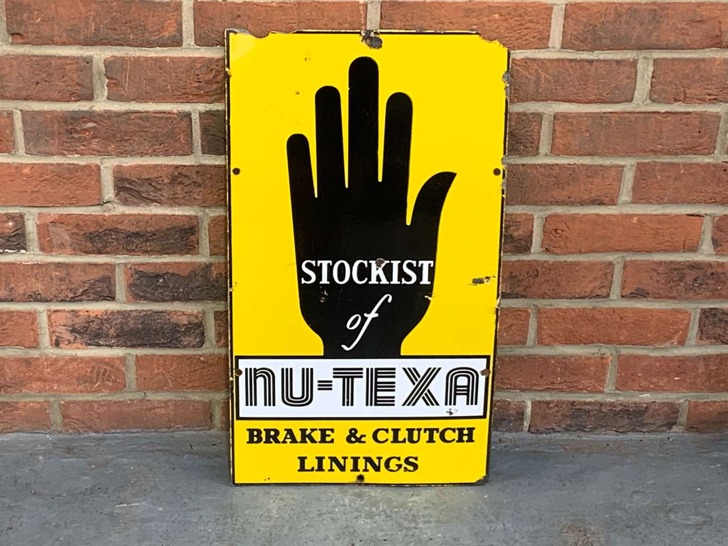 <p>NU-TEXA Brake and Clutch Linings Enamel Sign</p>