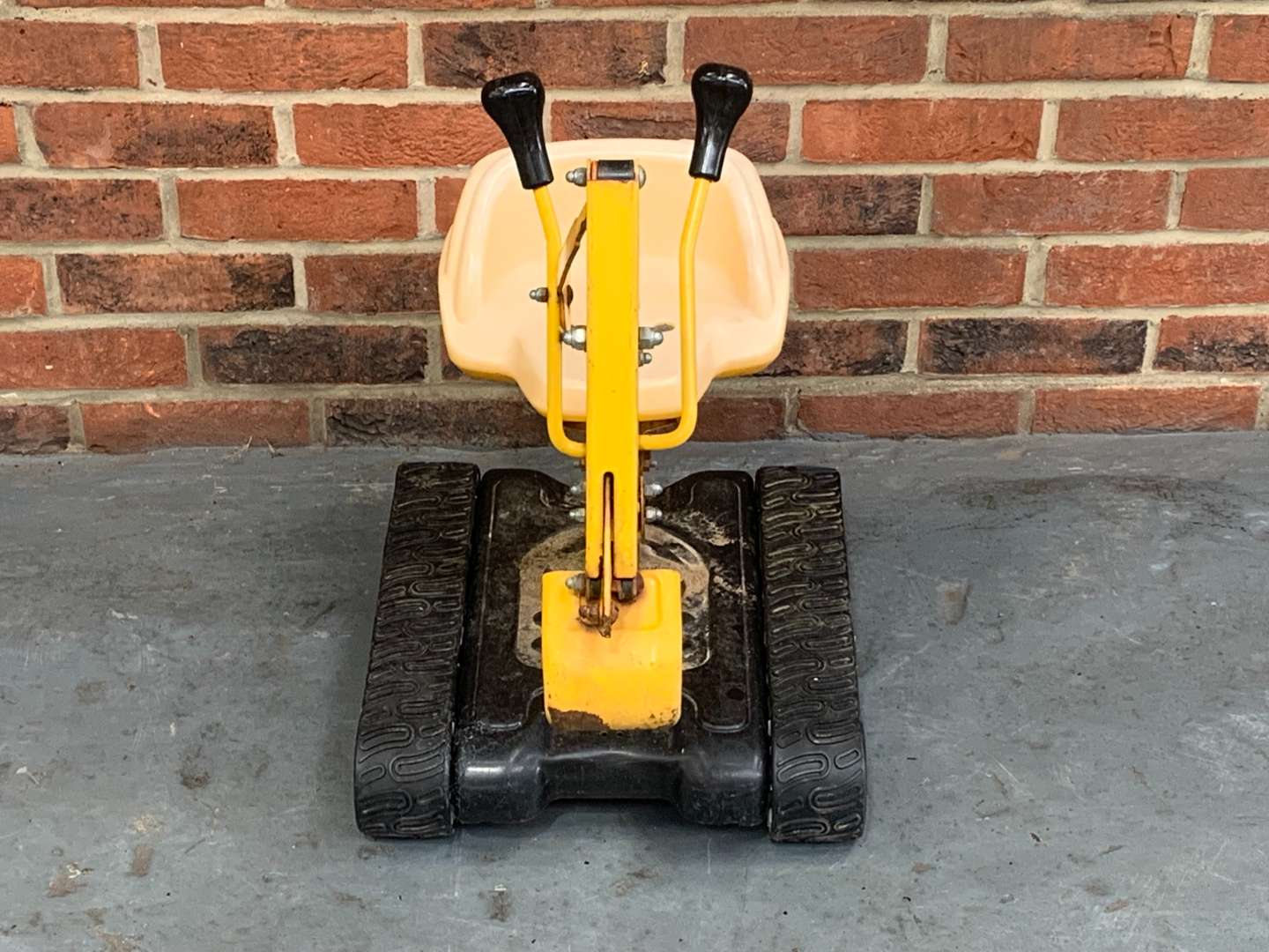 <p>Childs Tin Plate Sit On Digger</p>