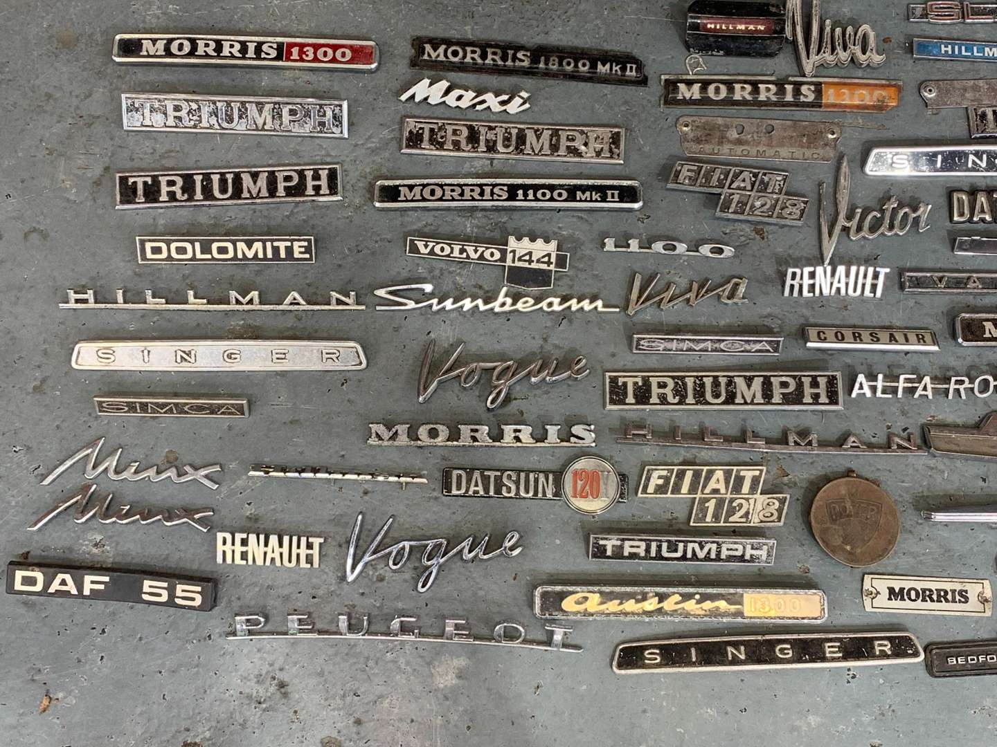 <p>Large Quantity of Classic Car Badges</p>