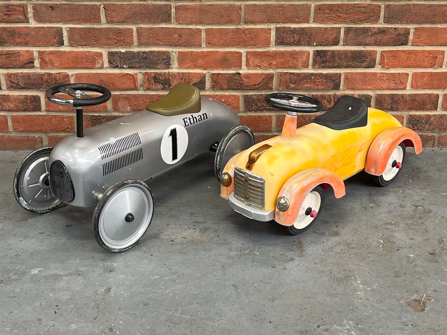 <p>Two Vintage Styled Childrens Push along Cars</p>