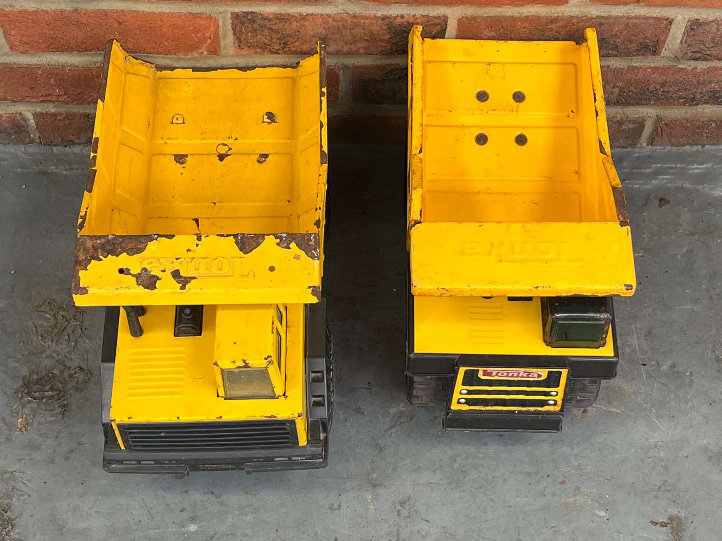 <p>Two Tonka Tin Plate Toy Trucks</p>
