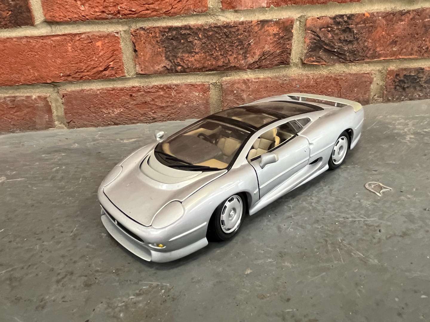 <p>Two Jaguar XJ220 Model Cars By Maisto</p>