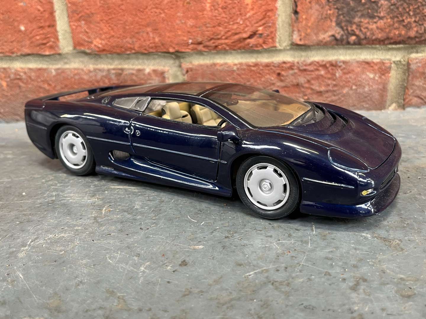 <p>Two Jaguar XJ220 Model Cars By Maisto</p>