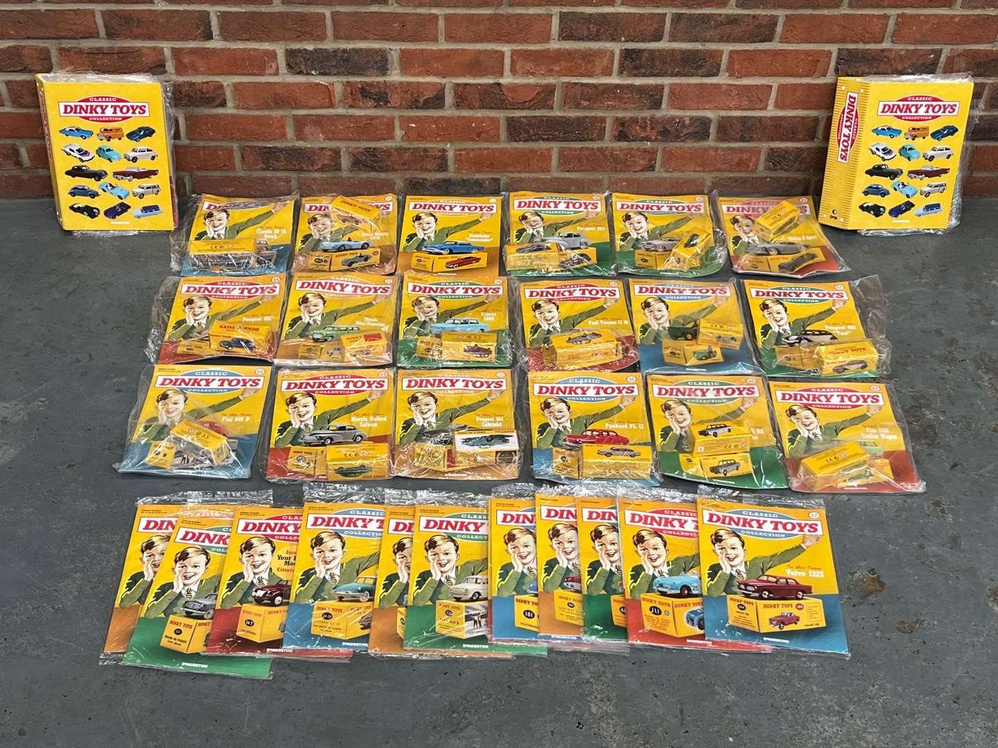 <p>Collection of Reproduction Dinky Toy Car and Magazines&nbsp;</p>