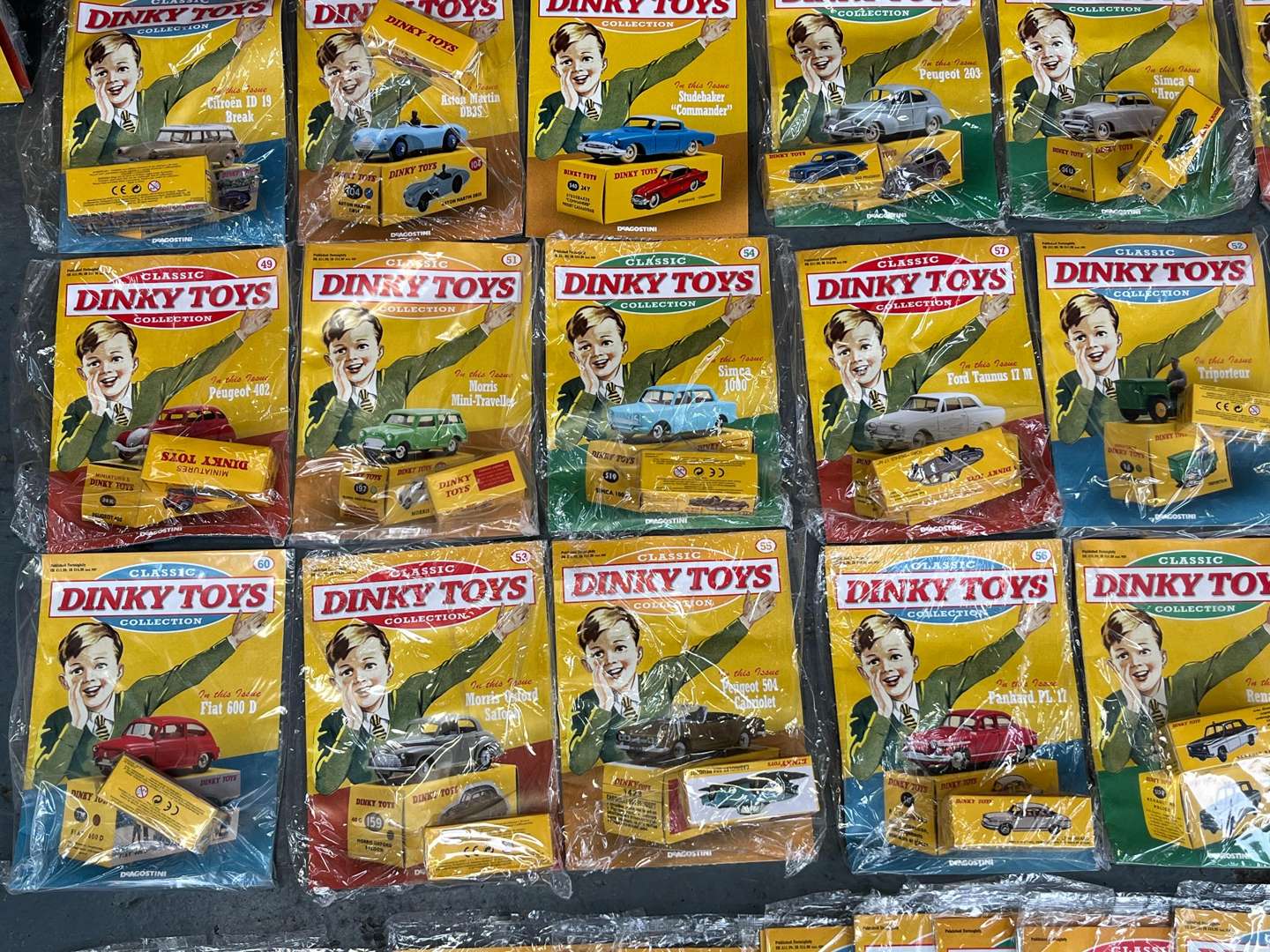 <p>Collection of Reproduction Dinky Toy Car and Magazines&nbsp;</p>