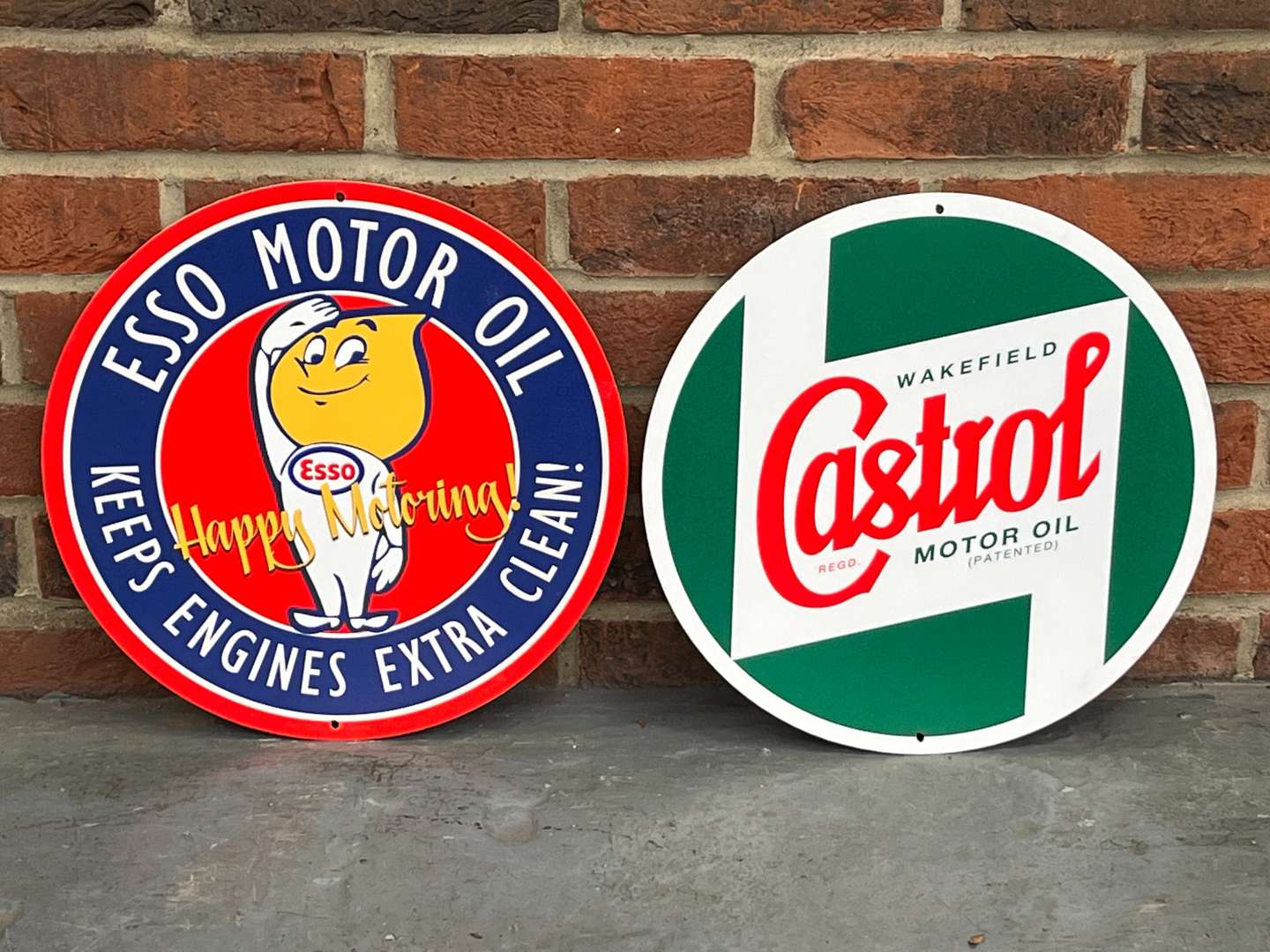 <p>Castrol and Esso Circular Metal Signs</p>