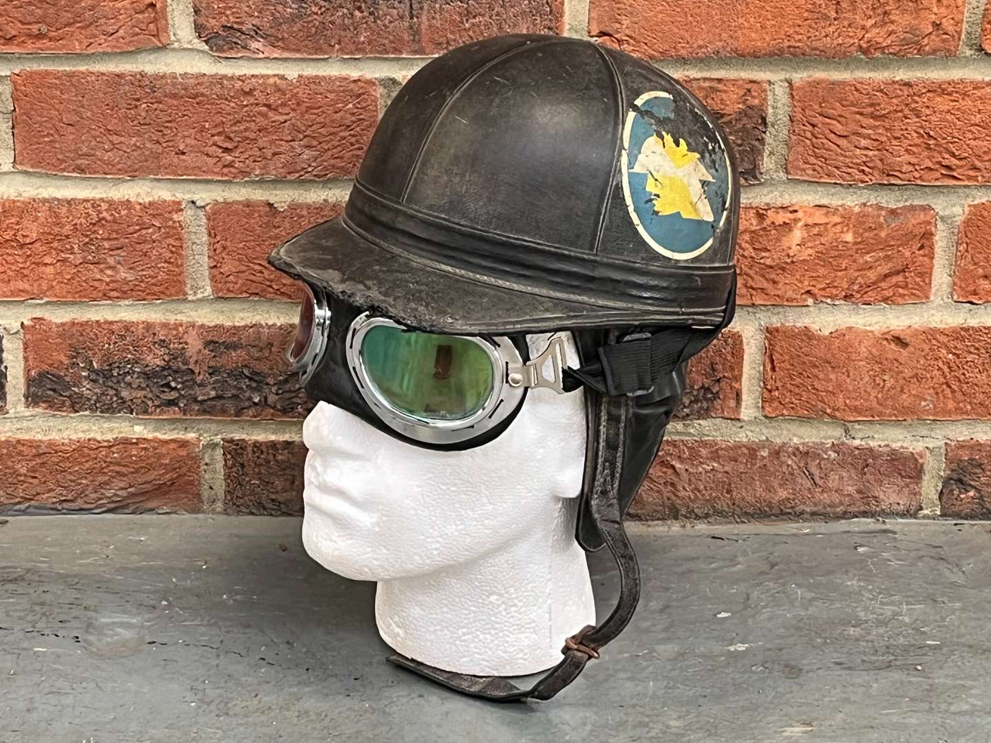 <p>Vintage Motorcycle Helmet and Goggles</p>