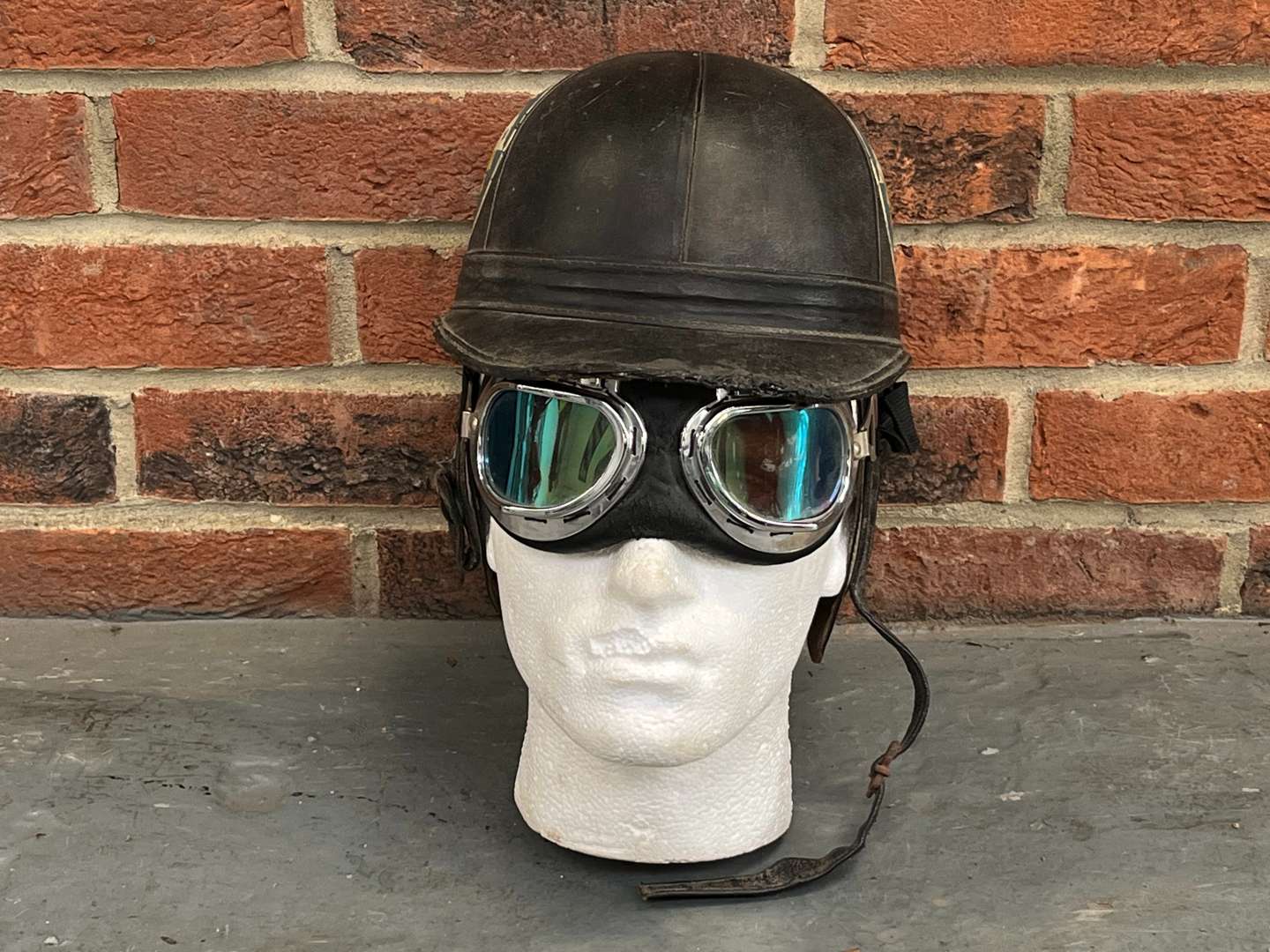 <p>Vintage Motorcycle Helmet and Goggles</p>
