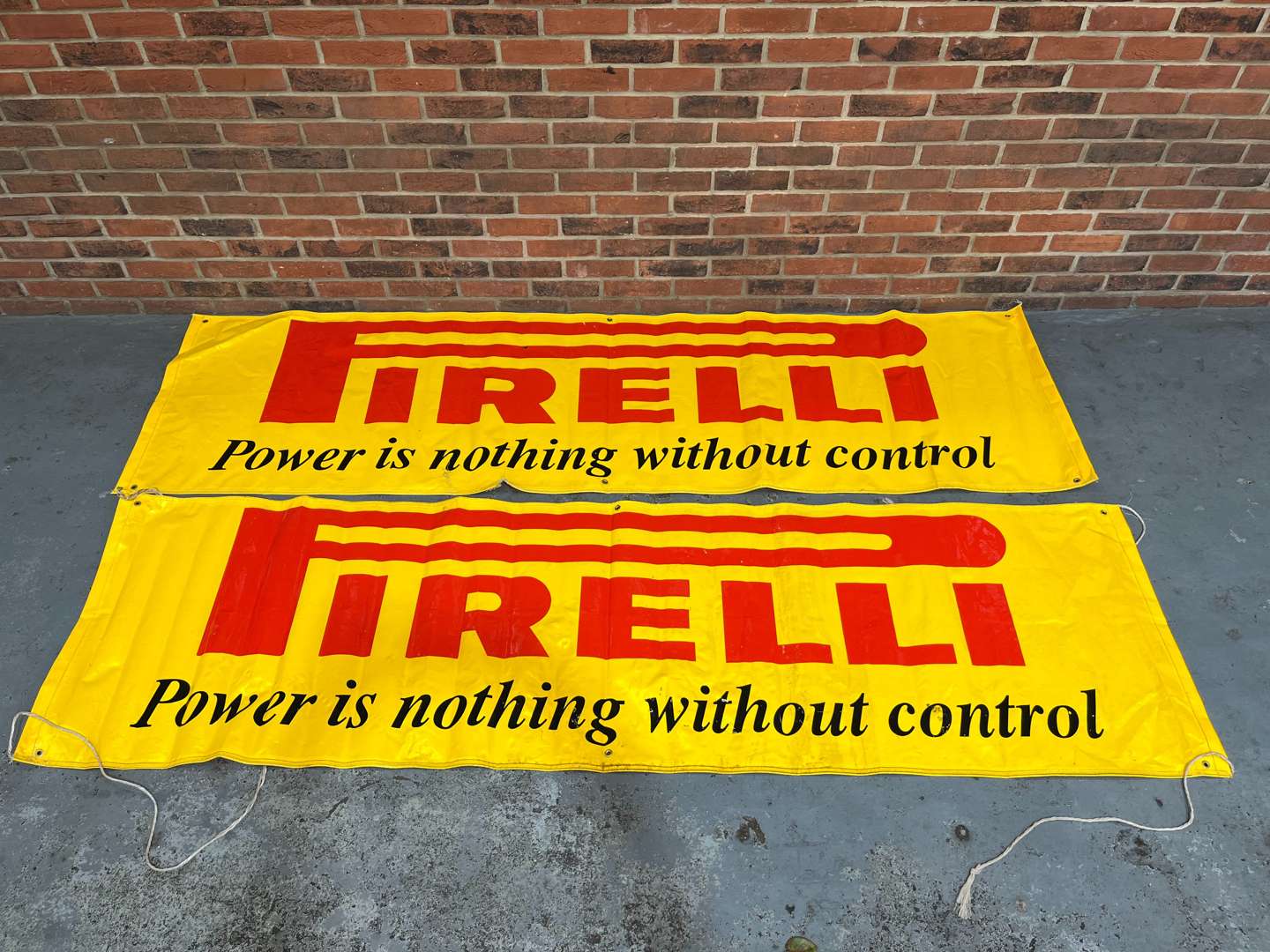 <p>Two Pirelli Garage Banners Power is Nothing Without Control</p>