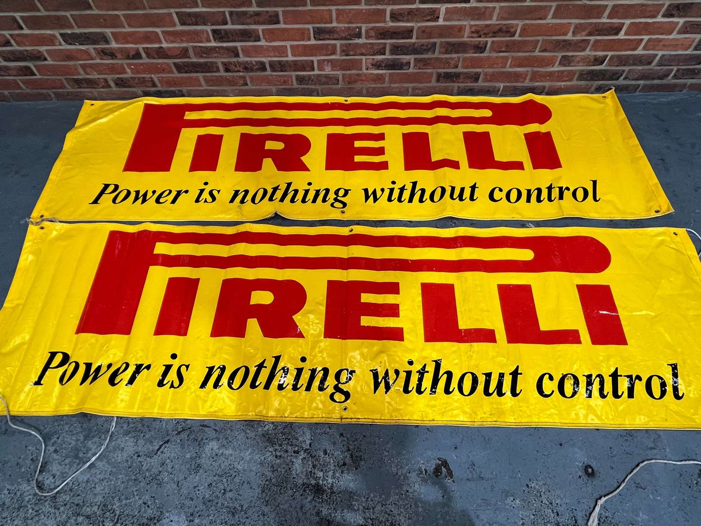 <p>Two Pirelli Garage Banners Power is Nothing Without Control</p>