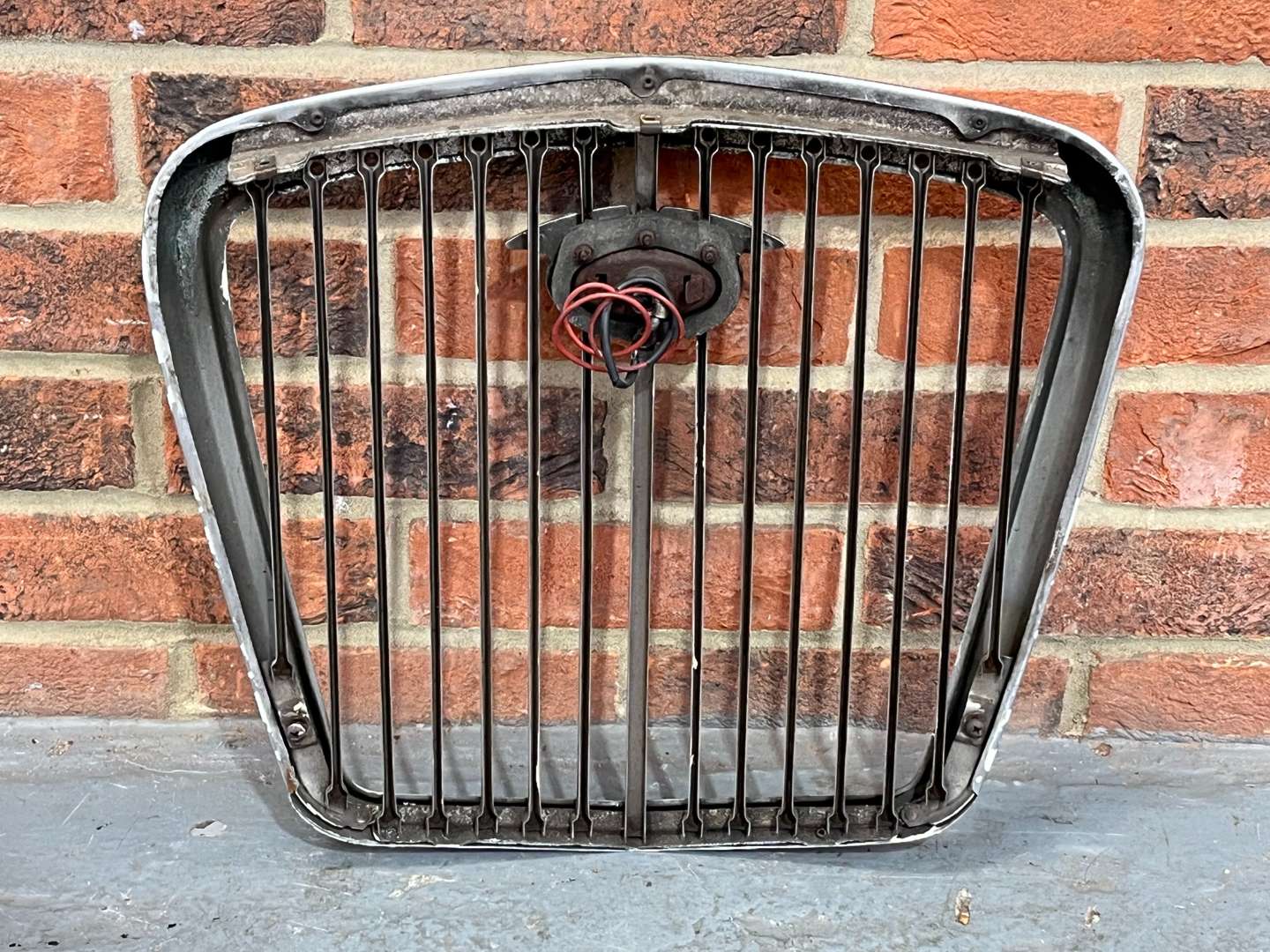 <p>Jaguar XKS Grille and Mascot Together With a Wolseley Grille (3)</p>