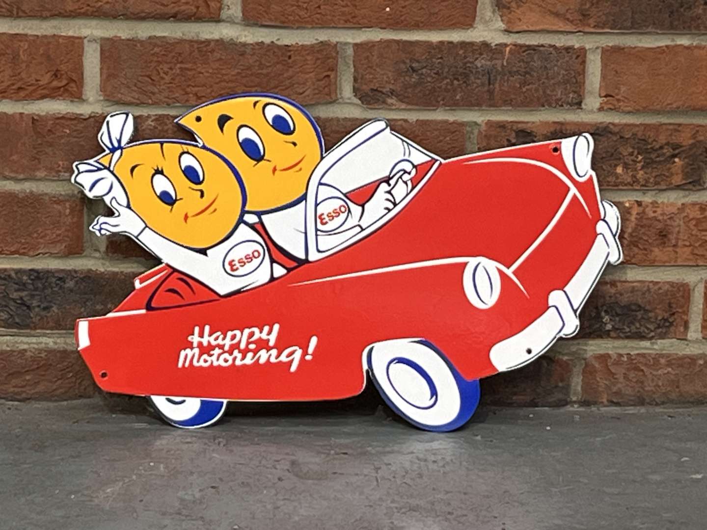 <p>Esso Mr and Mrs Drip Happy Motoring Enamel Sign</p>