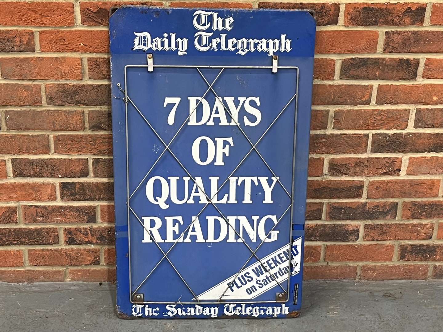<p>Metal The Daily Telegraph Sign</p>