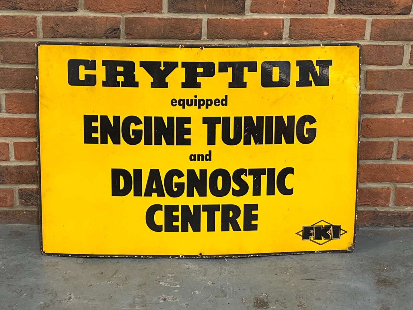 <p>Crypton Engine Tuning and Diagnostic Centre Enamel Sign</p>