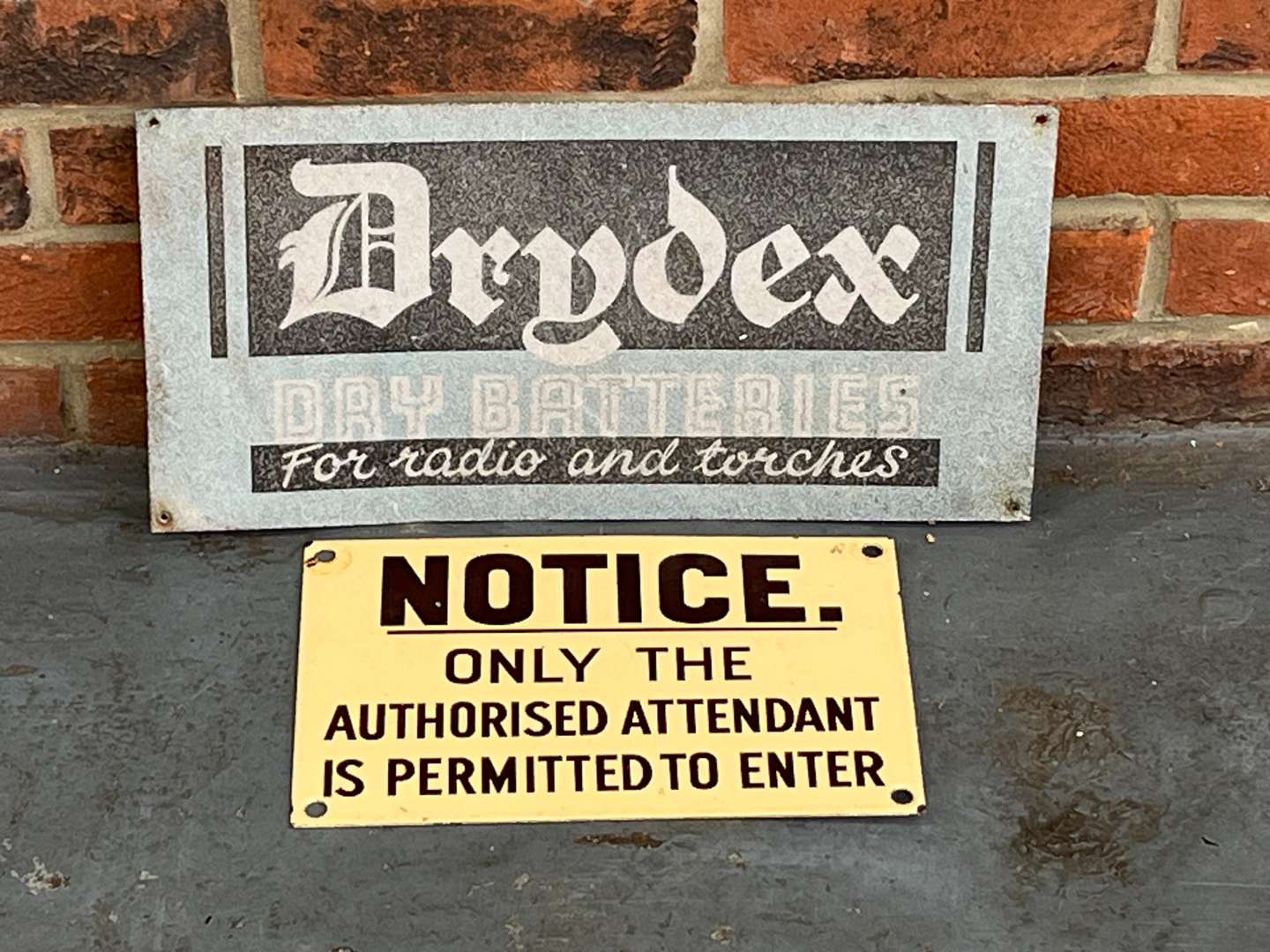 <p>Drydex Batteries and Enamel Notice Signs (2)</p>