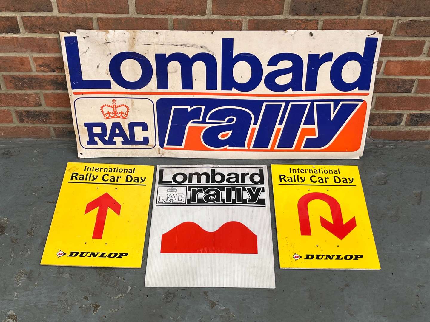 <p>Two Lombard Rally Signs and Two Dunlop Signs (4)</p>