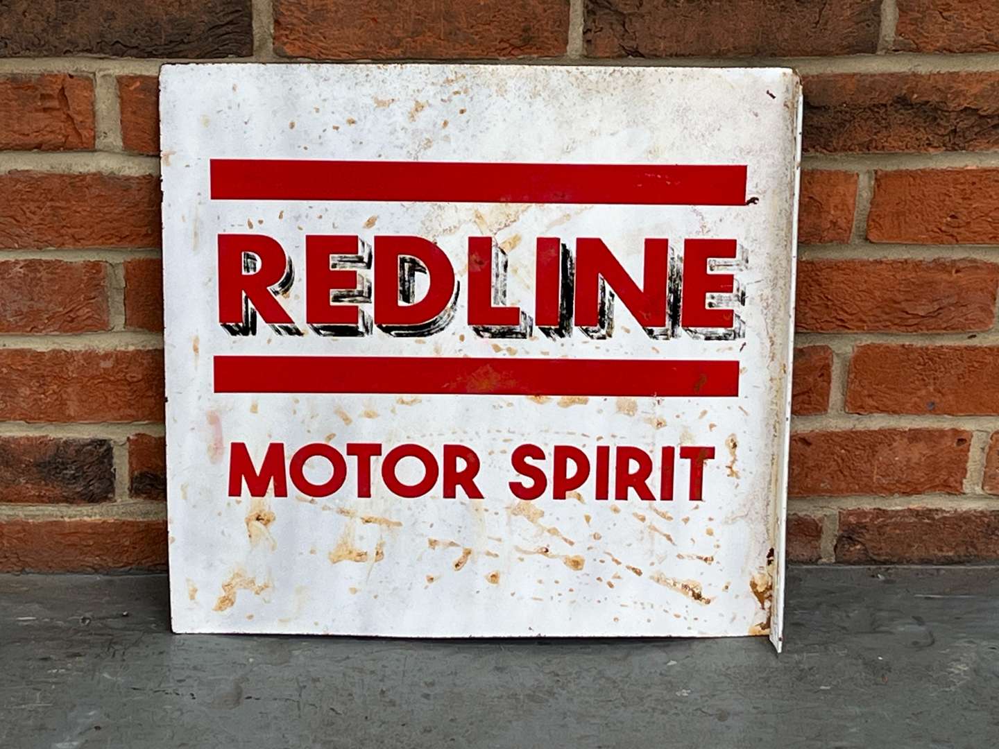 <p>Redline Motor Spirit Made Flange Sign</p>