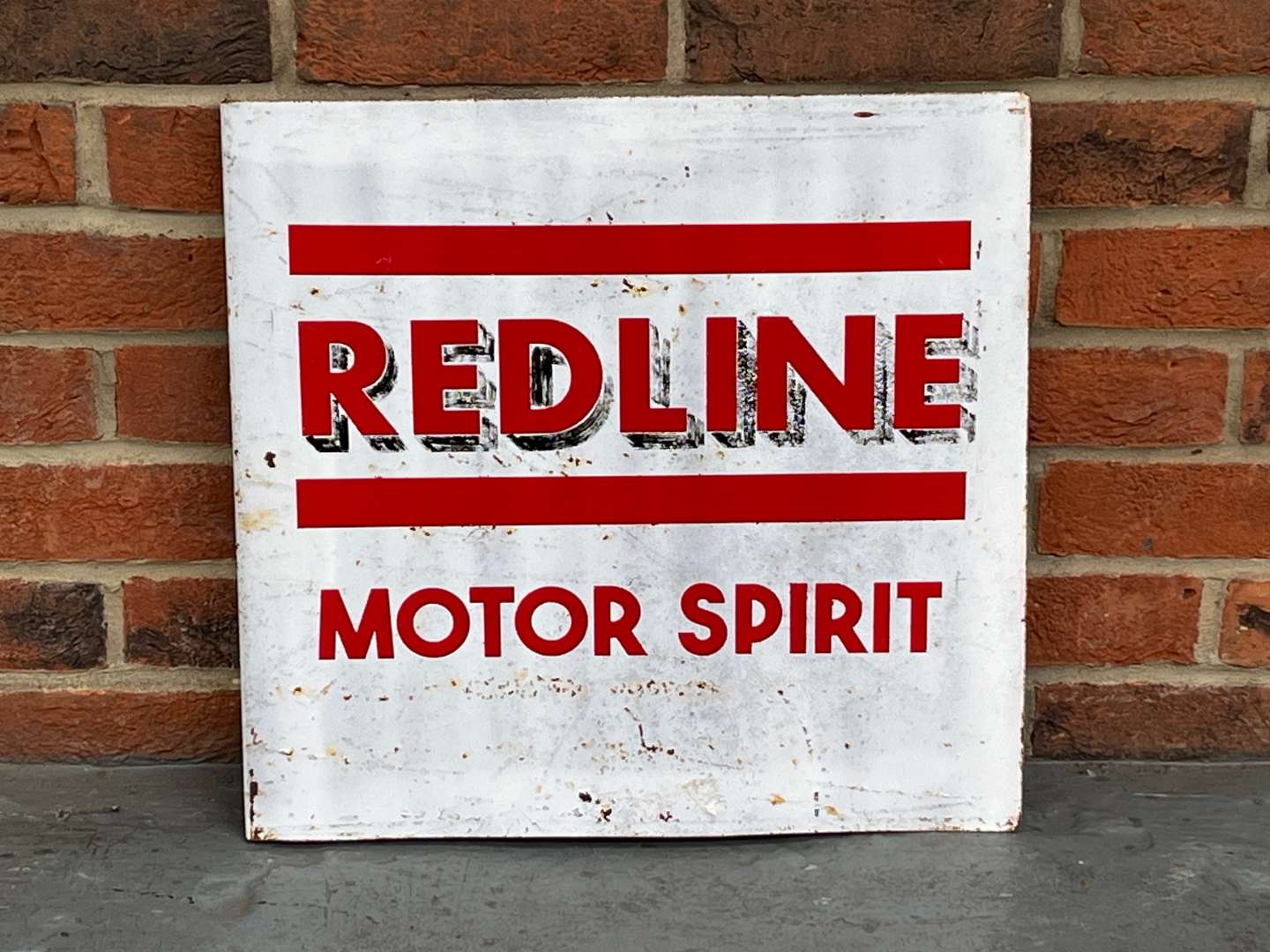 <p>Redline Motor Spirit Made Flange Sign</p>