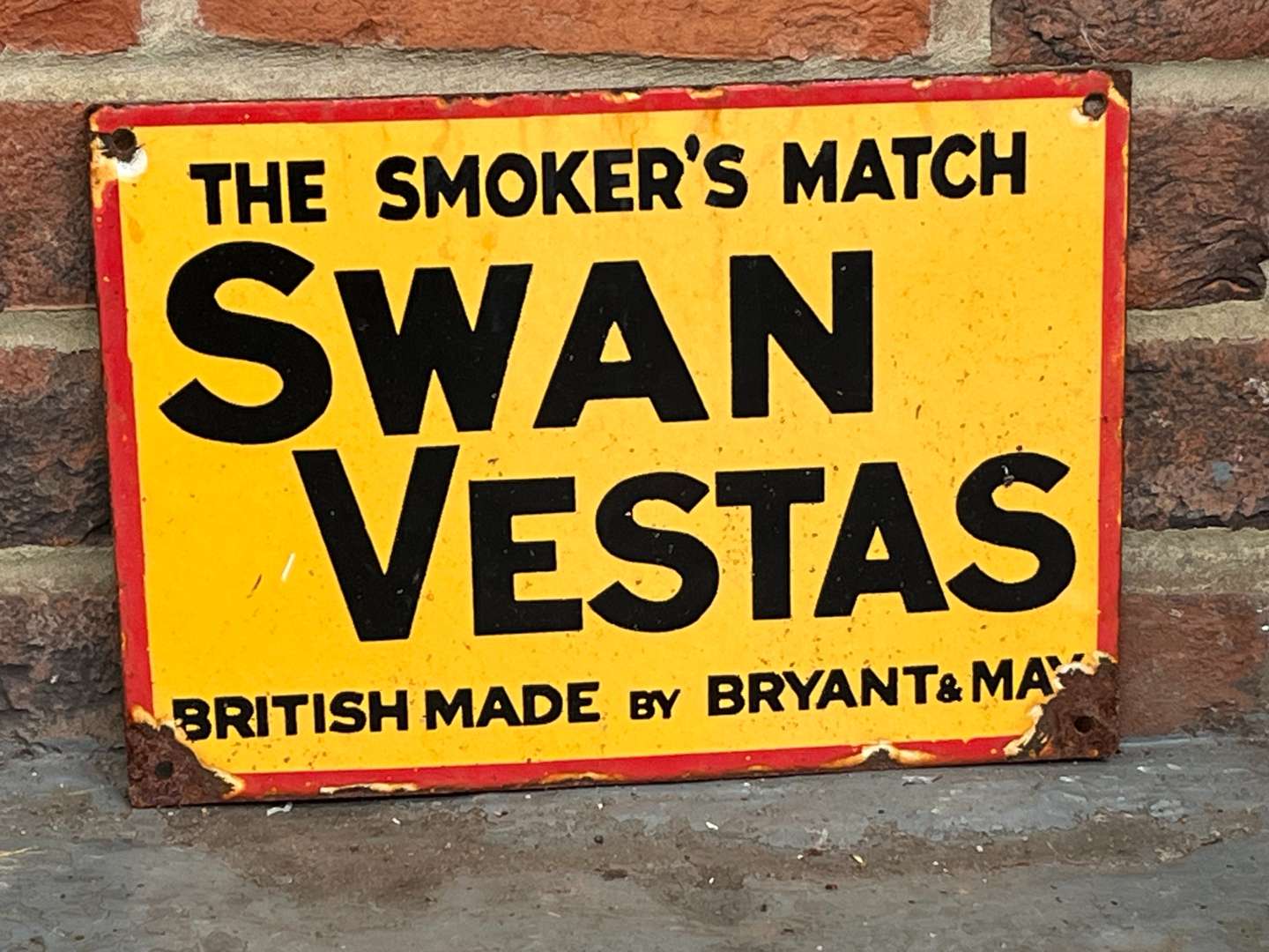 <p>The Smokers Match Swan Vestas Enamel Sign</p>