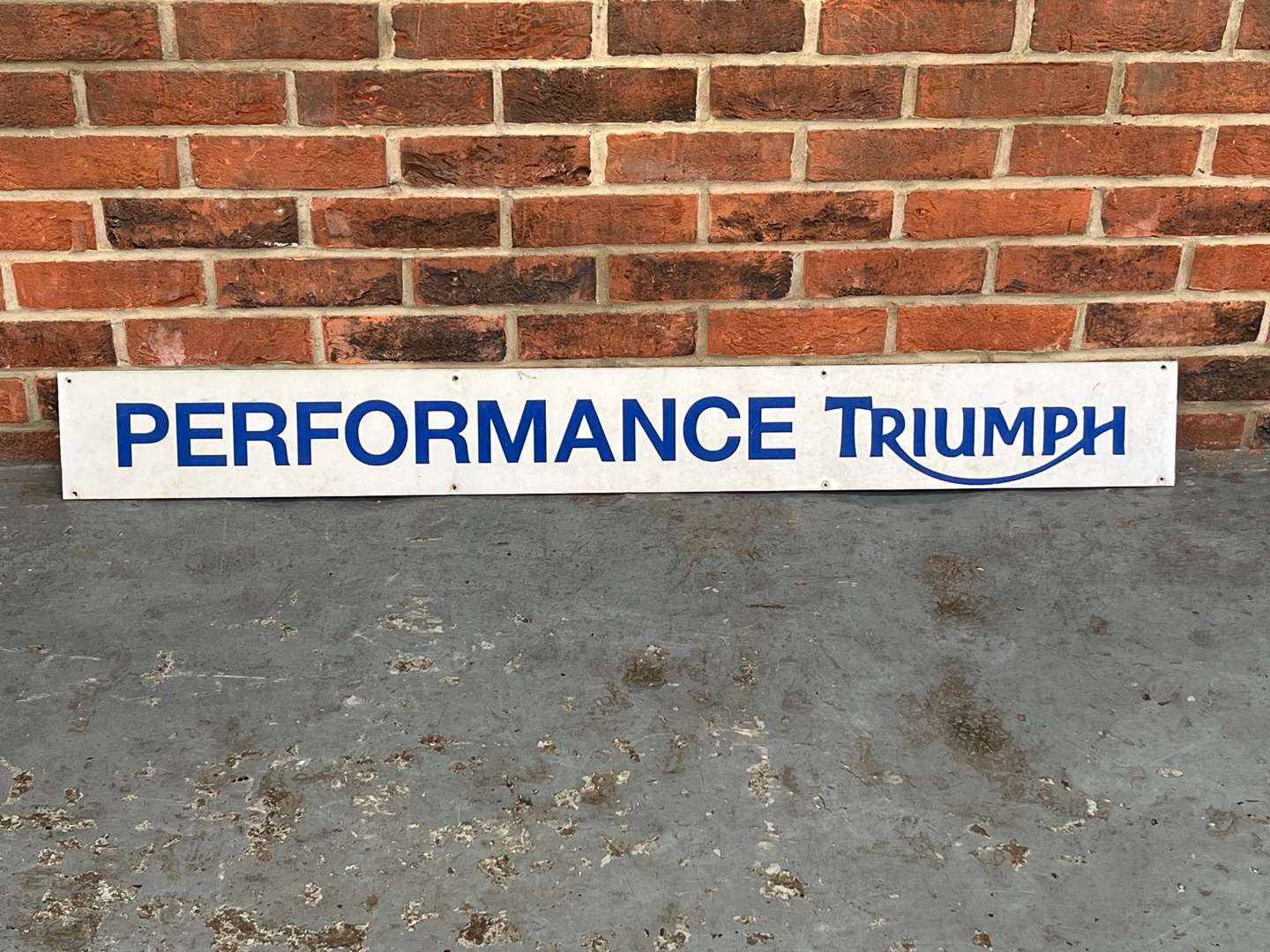 <p>Performance Triumph Metal Sign</p>