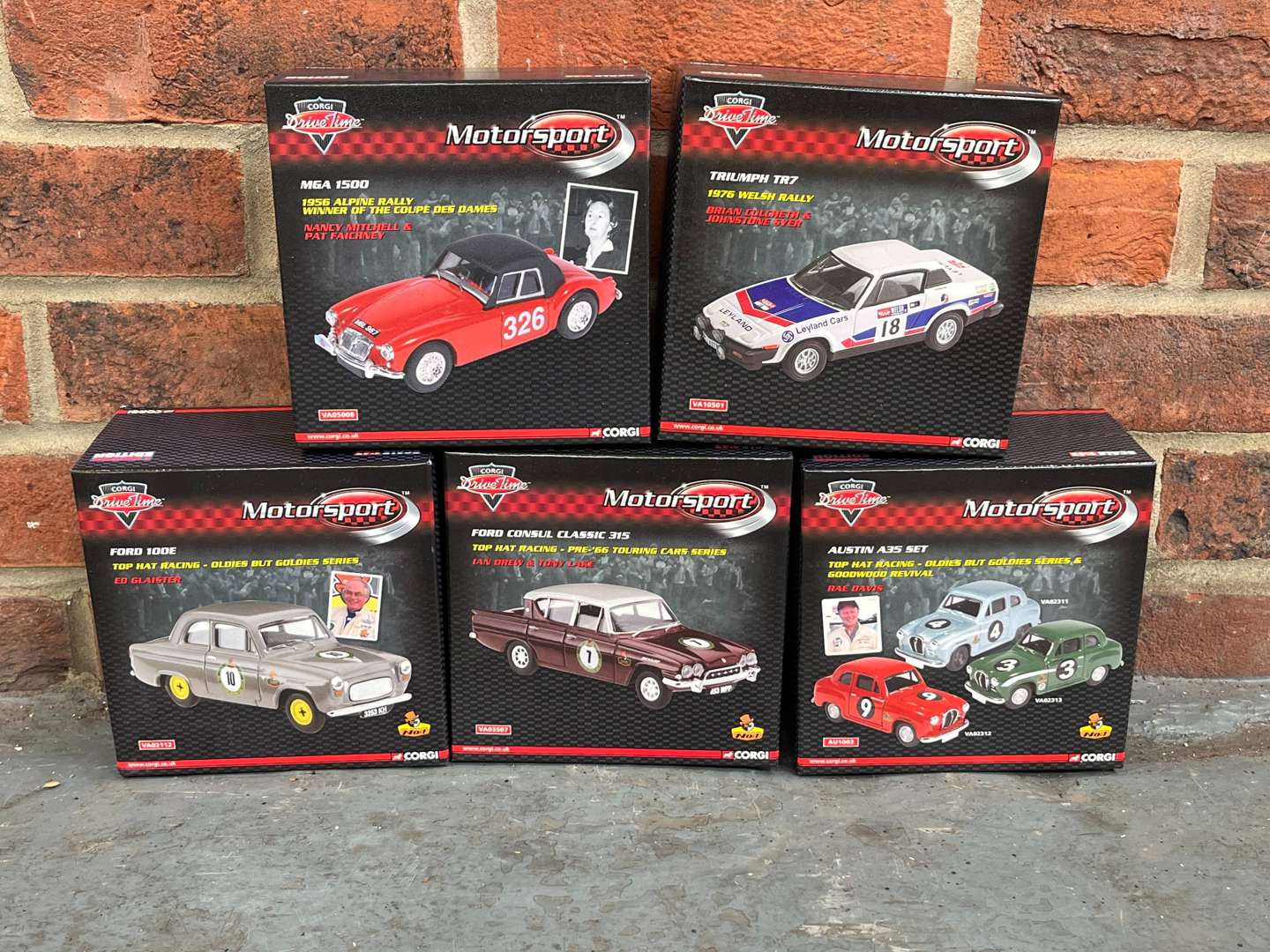 <p>Five Boxed Corgi Drive Time Motorsport Model Cars</p>