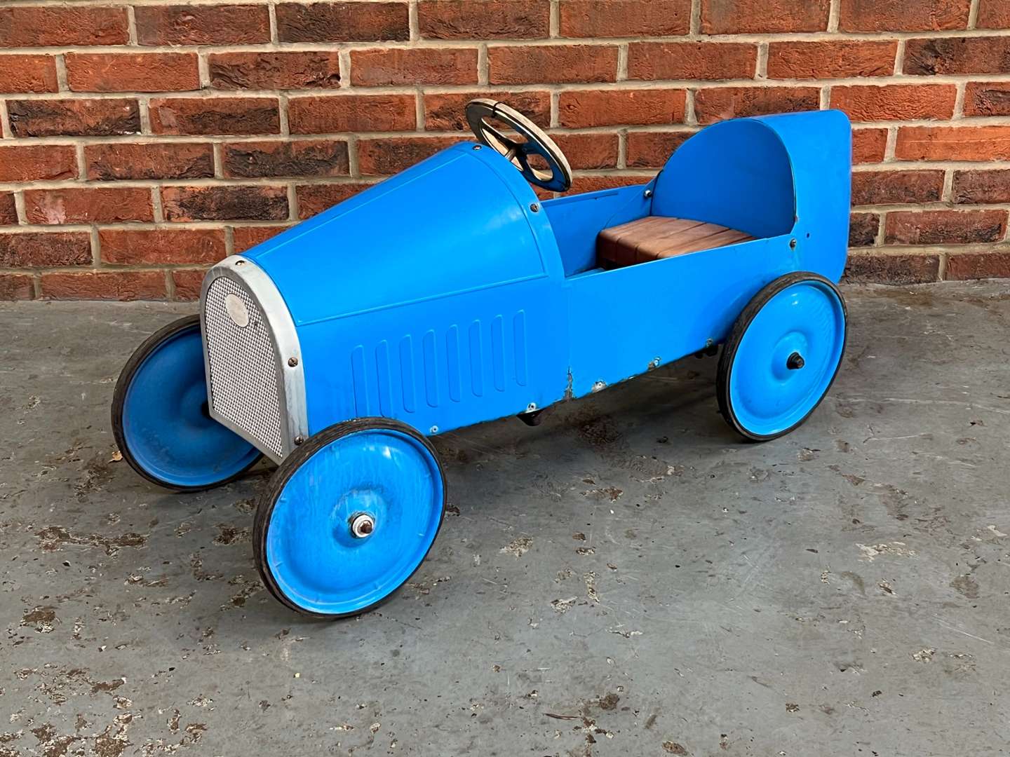 <p>Tin Plate Childs Pedal Car</p>