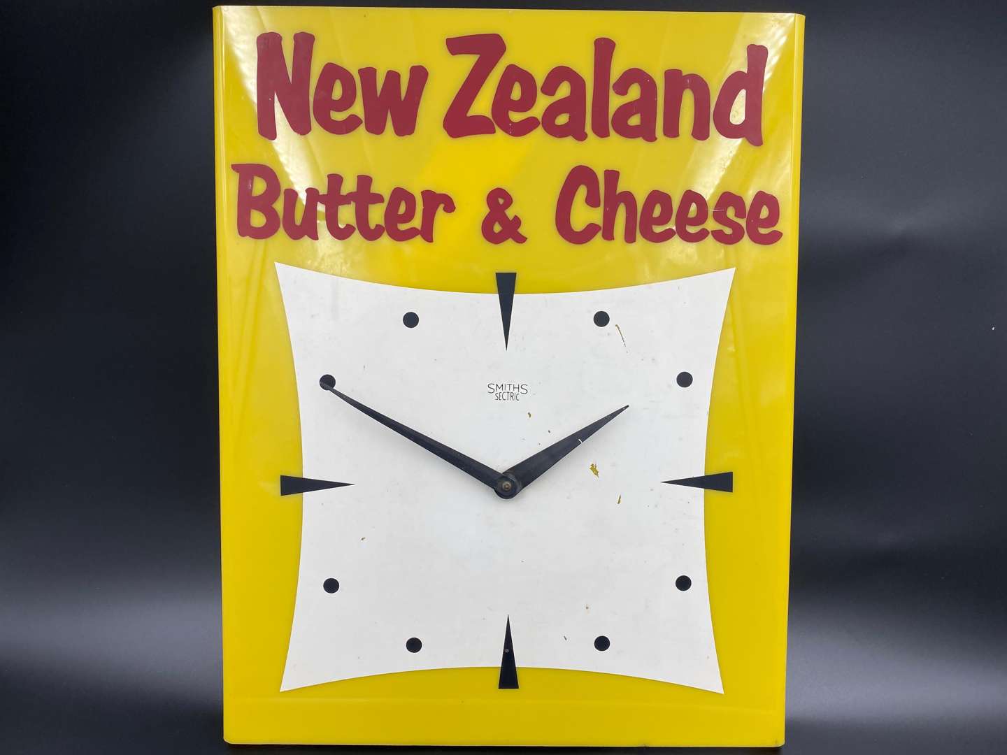 <p>SMITH'S, 1950's rectangular perspex “New Zealand, Butter & Cheese” Electric Wall Clock</p>