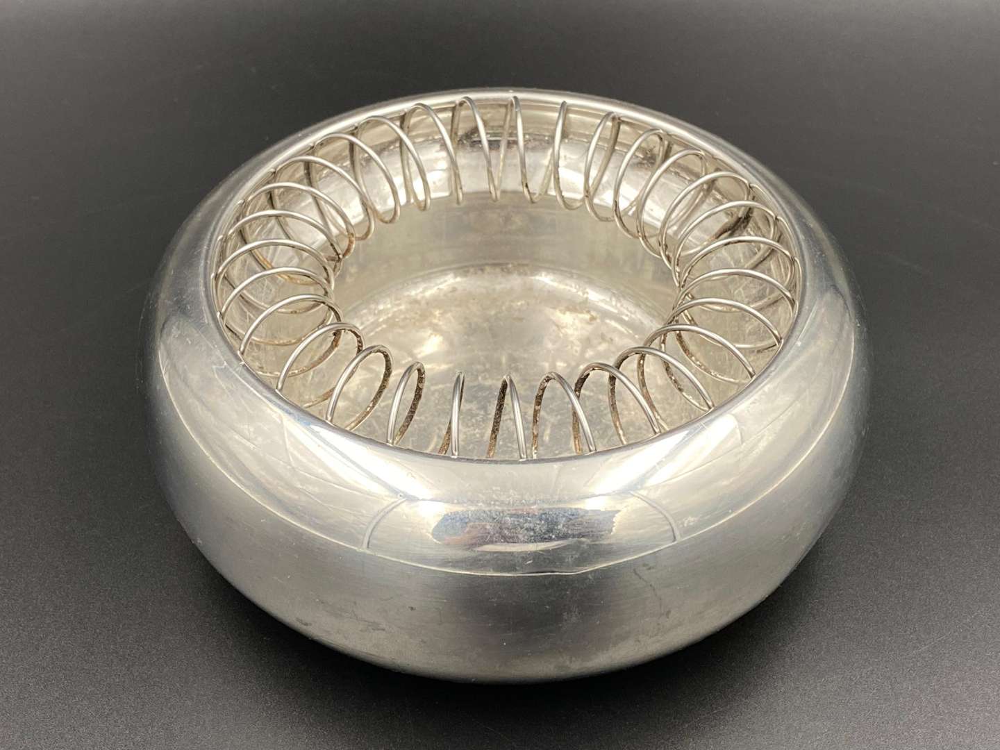 <p>ALESSI, “Spirale”, polished aluminium ashtray,</p>