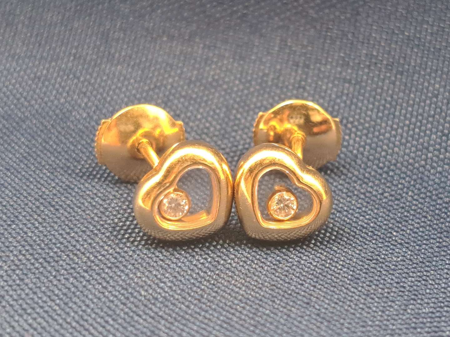 <p>CHOPARD, a pair of “Happy Diamond” glazed heart shaped earrings</p>