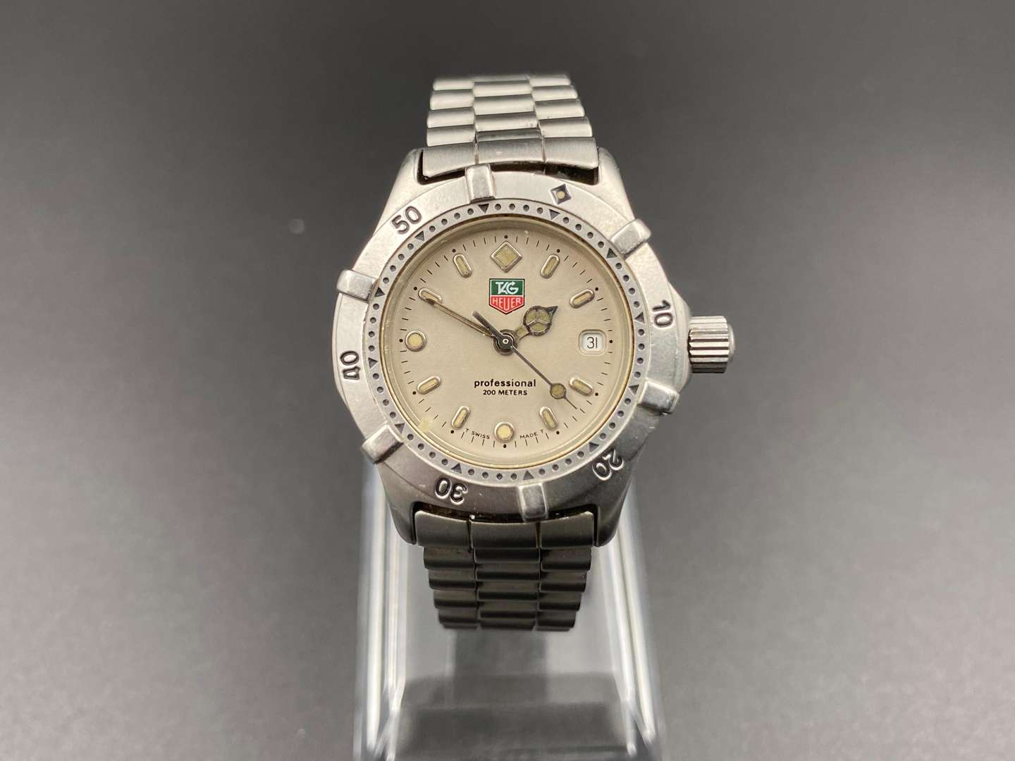 <p>TAG-HEUER, “Professional 2000”, ladies, quartz, stainless steel, centre seconds, calendar wristwatch, WE1411-R</p>