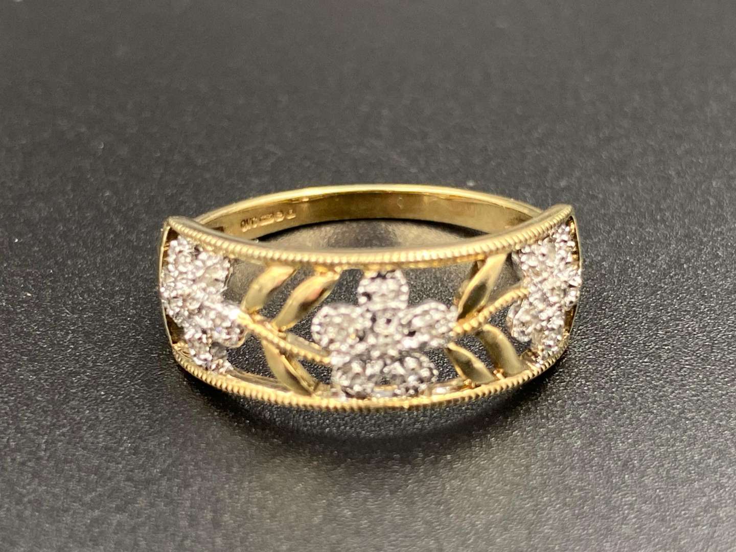 <p>Diamond set, floral work, yellow gold ring</p>